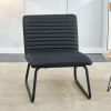 Black minimalist armless sofa chair with PU backrest, paired with black metal legs, suitable for offices, restaurants, kitchens, and bedrooms